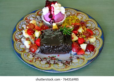 Black Forest Brownie With Butterfly Pea Ice Cream And Fruit.