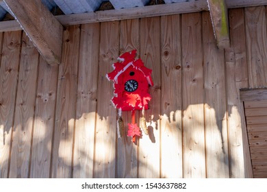 Black Forest Clock On A Wooden Barn