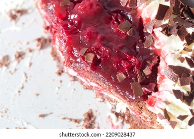 Black Forest Gateaux Dessert, Part Eaten, On A Grey Stoneware Plate