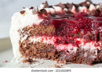 Black Forest Gateaux Dessert, Part Eaten, On A Grey Stoneware Plate