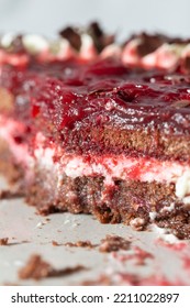 Black Forest Gateaux Dessert, Part Eaten, On A Grey Stoneware Plate