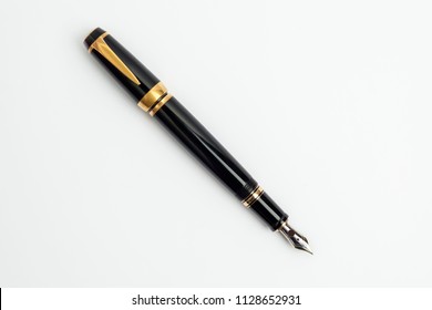 Black Fountain Pen And White Background.