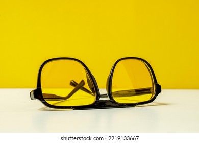Black Frame Sunglasses With Yellow Lenses