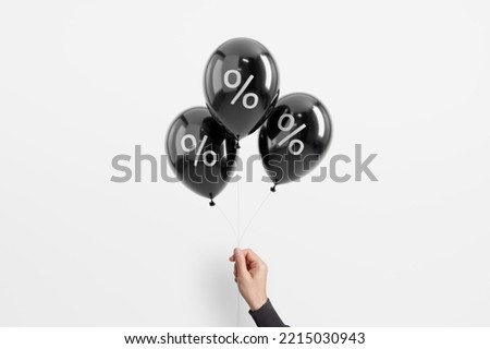 Black Friday sale with percent in black glossy balloon minimal on white background, minimalist poster.