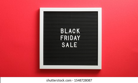 Black Friday Sale Sign On Letter Board Over Red Background