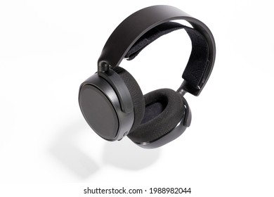 Black Gaming Headphones On White Background. Floating Headphones With A Shadow