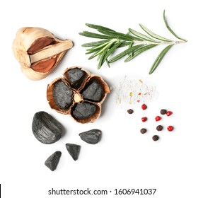 Black Garlic, Herbs And Spices On White Background