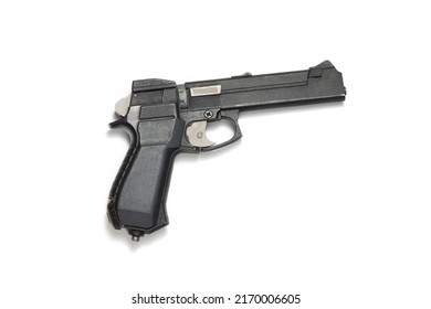 Black Gas Gun On A White Background In Close-up. Air Gun Pneumatic