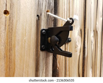 Black gate latch with string