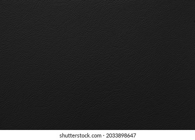 Black genuine cow leather of the sofa texture and background seamless