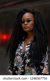 Black Girl Magic Afro Punk Outdoors Fashion Portrait In A Dark Wall With Giant Red Bokeh Balls 