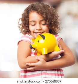 black girl with a piggy bank