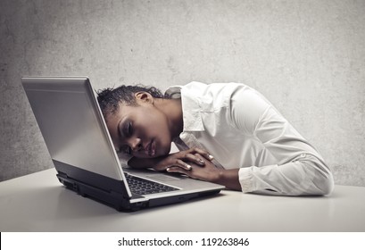 Black Girl Sleeping On A Laptop Computer