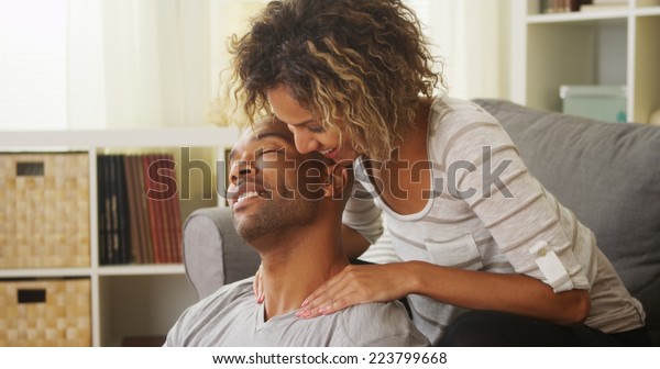Black Girlfriend Giving Boyfriend Massage Stock Photo Edit Now 223799668