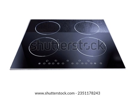 Black glossy built in ceramic glass induction or electric hob stove cooker with four burners, isolated on white background.