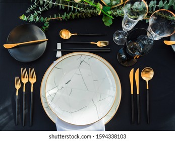 Black and gold color Luxury table elegant set for Wedding reception in barn.Waiting for the guest