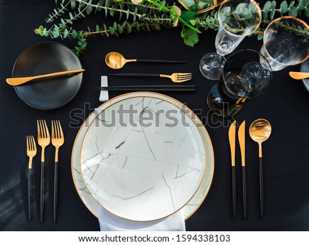 Black and gold color Luxury table elegant set for Wedding reception in barn.Waiting for the guest