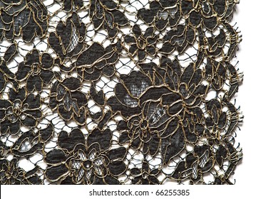 Black And Gold Lace On A White Background.