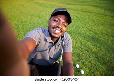 Black Golfer Takes A Selfie On An Outdoor Golf Course.