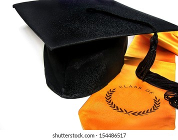 Black Graduation Cap With Gold Satin Sash On White