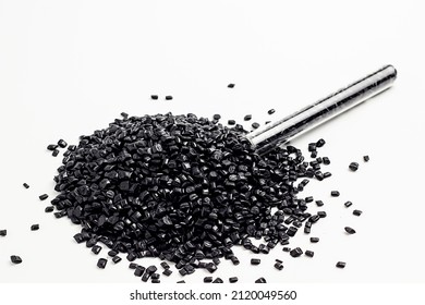 Black Granules Of Polypropylene, Polyamide. White Background. Plastic And Polymer Industry. Microplastic Products.