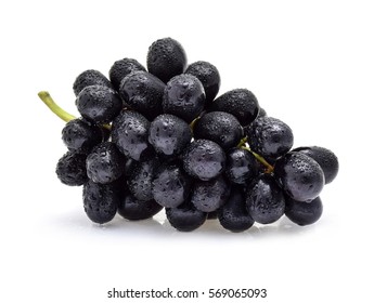 Black grapes with drop of water isolated on white background.
