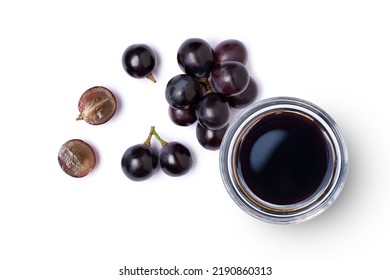 Black Grapes And Grape Molasses In Glass Bowl Isolated On White Background, Top View, Flat Lay.