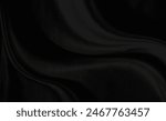 Black gray satin dark fabric texture luxurious shiny that is abstract silk cloth background with patterns soft waves blur beautiful.