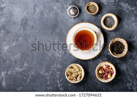 Similar – Foto Bild Tee Tasse mit Kräutertee Teebeuteln