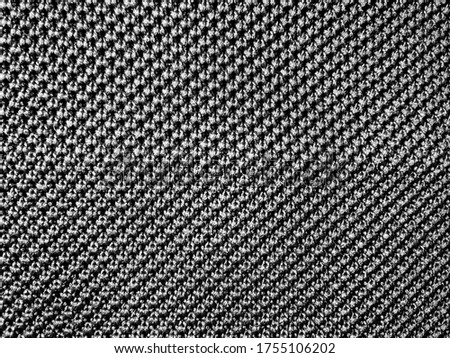 black and grey dotted texture background , black clothing texture background.