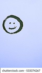 Black Grey Smiley Face Painted Onto A White Background With Nail Polish