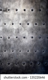 Black Grunge Metal Plate Or Armour Texture With Rivets As Background