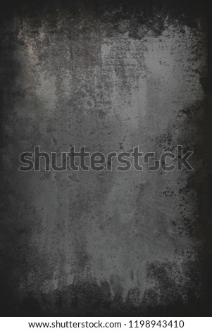 Black  grunge metal textured wall background with scratches.  
