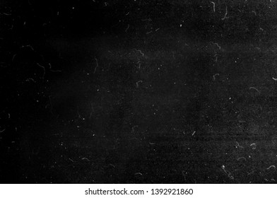 Black grunge scratched background, old film effect, dusty scary texture