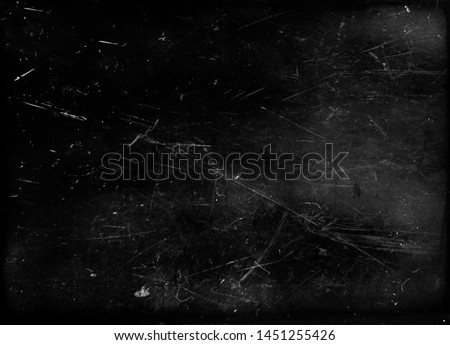 Black grunge scratched metal background, scary distressed horror texture