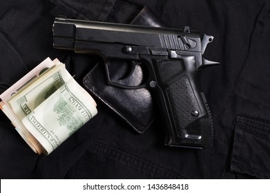 Black Gun And Black Purse. Buying A Weapon. Top.