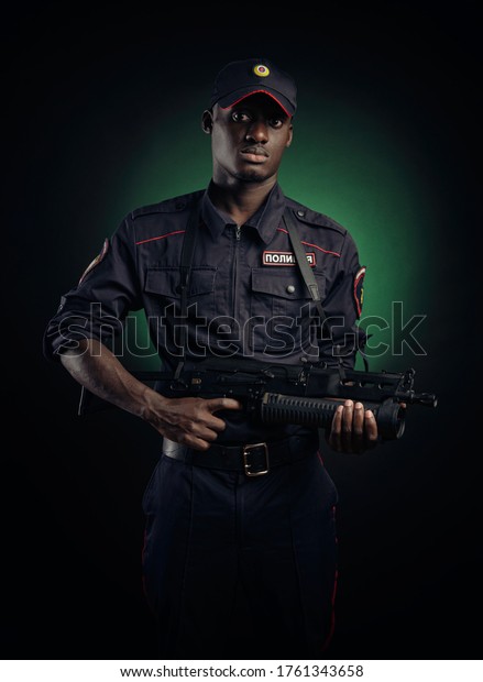 black guy in force police. english translation\
Police, Russia