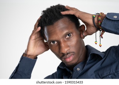 A Black Guy (man) In A Blue Shirt