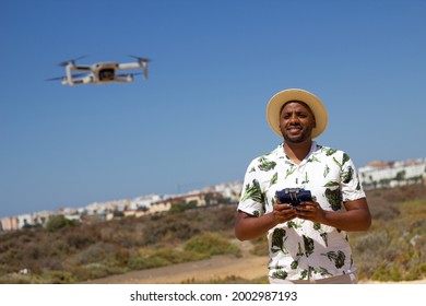 A black guy pilots a drone
