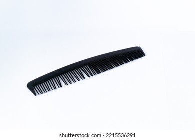 Black Hair Comb. Isolated On White Background.