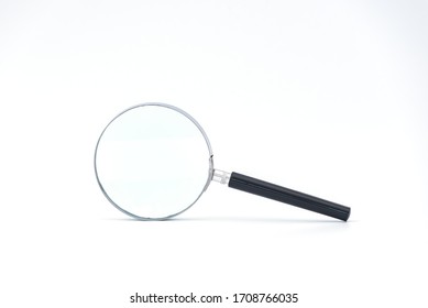 Black Handle And Metal Rim Magnifying Glass On A White Background