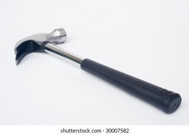 Black handled claw hammer against white background