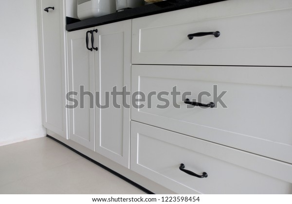 Black Handles On White Doors Drawers Stock Photo Edit Now 1223598454