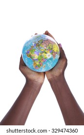 Black Hands Holding A World Globe Isolated On White