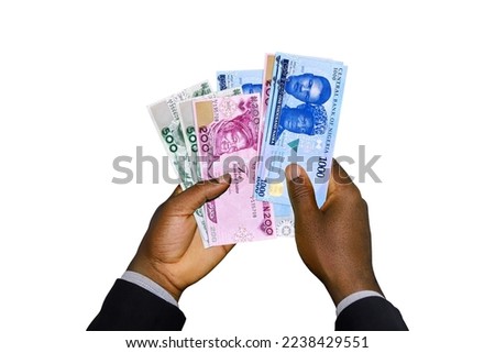 Black Hands in suit holding 3D rendered New Nigerian Naira notes