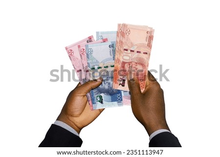 Black Hands in suit holding 3D rendered New South African Rand notes