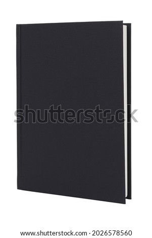 Black hardcover book upright on white with clipping path
