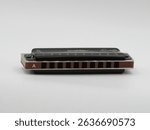 Black Harmonica on a White Background