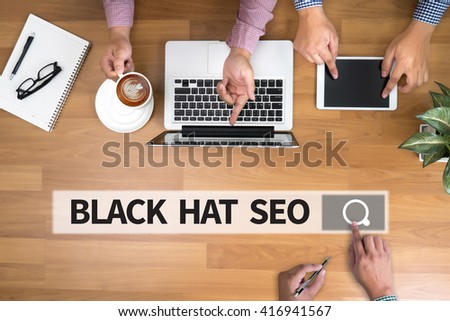 BLACK HAT SEO man touch bar search and Two Businessman working at office desk and using a digital touch screen tablet and use computer, top view