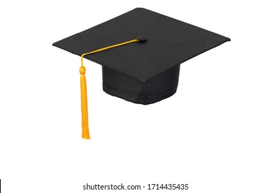Black hats, golden tassels of university graduates on isolated background and clipping path